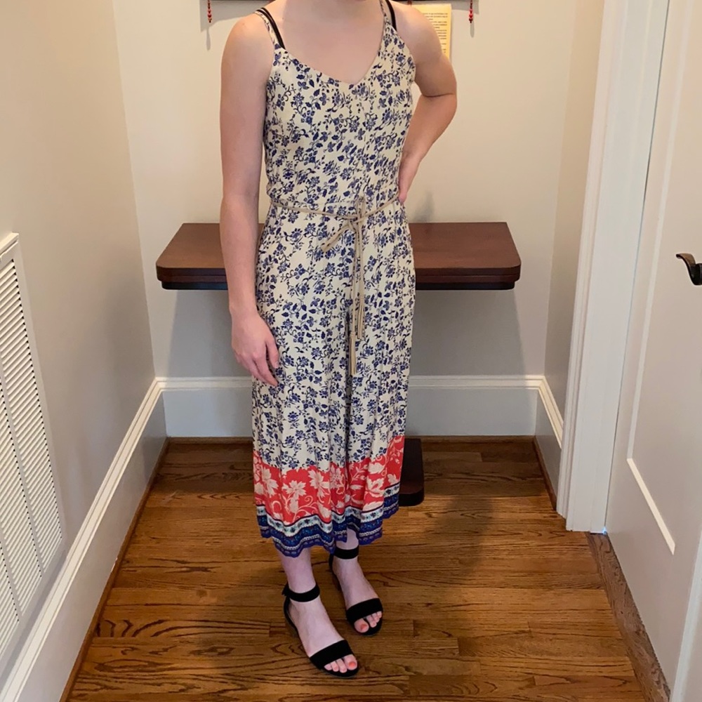 Adorable jumpsuit with thin leather tassel belt